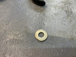 The other, recessed, side of the washer was filed flat.