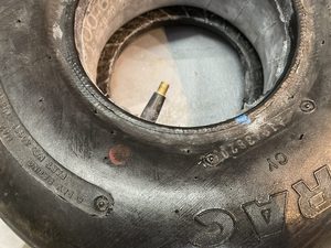 In all cases the red dot is aligned adjacent to the valve. This assists dynamic balancing, as the tyre is slightly lighter in the region, cancelling to some extent the additional mass of the valve