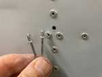 Short 4mm rivet in centre side skin