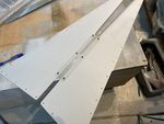 Rivnut stiffener for centre console inside upper skin