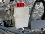 Coolant bottle mounting