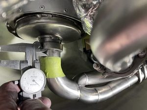 header image for Alteration of RH muffler clamping for coolant hose clearance