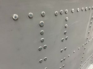 Epoxy filling of fuselage and wing rivets - We Build Planes