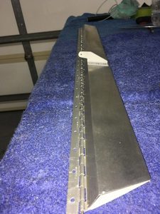 The result after riveting, showing hinge knuckle clearance
