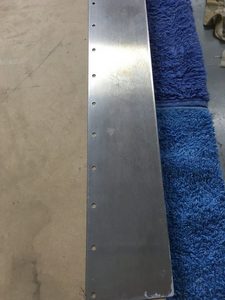 Distance between holes and edge on flat part of skin was constant along the edge.