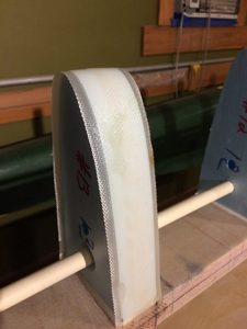 Each location where the wing skin is supposed to butt join the adjacent wing skin the rib is covered with 2 inch glass tape.