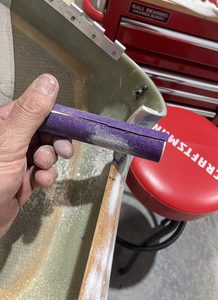 Sandpaper superglued to various PVC pipe sizes made good sanding blocks for curved surfaces.