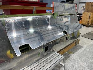 header image for Lower Outer Wing Skin Riveting and Upper Conduit Installation