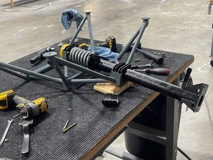 Assembling the nose gear on the motor mount.