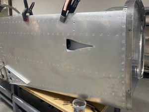 Inlet for the NACA ducts after riveting them on and cleaning up the SikaFlex.