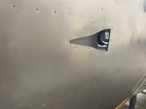 Inlet for the NACA ducts after riveting them on and cleaning up the SikaFlex.